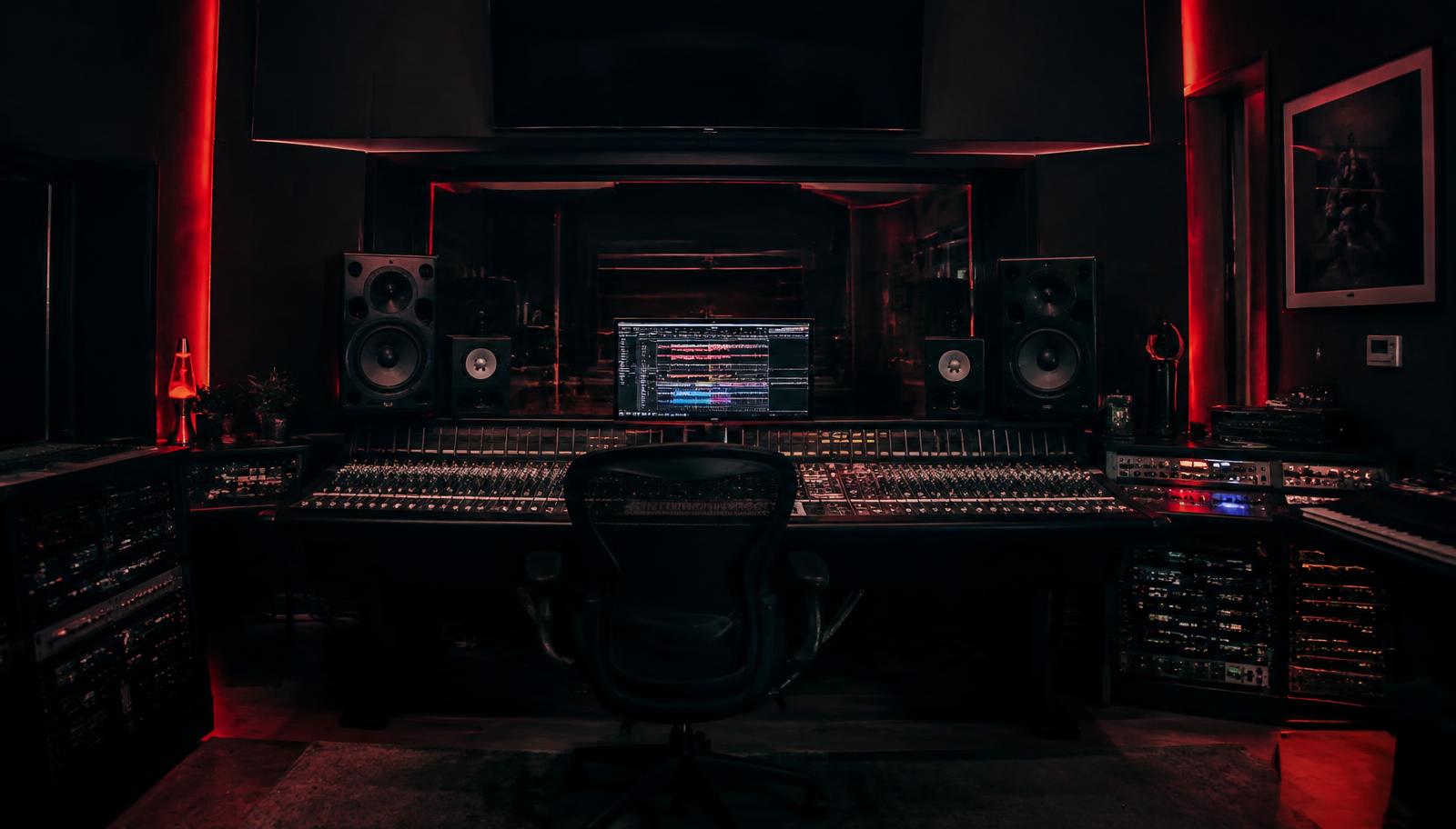 Control room with mixing console and monitors