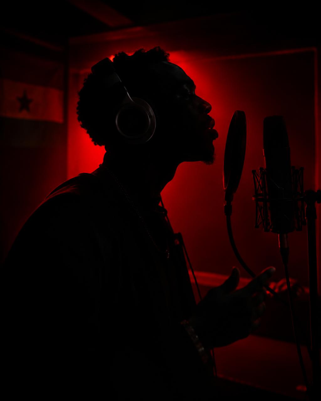 Artist recording a vocal take